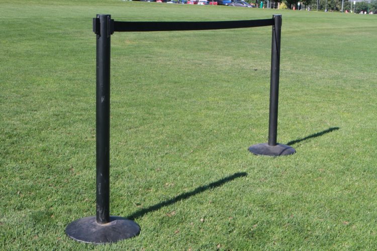 Two stanchions together on grass